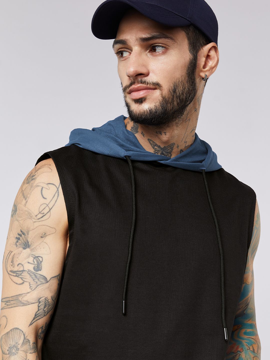 Buy Colourblock Black & Denim Blue Men Hooded Vest Online.
