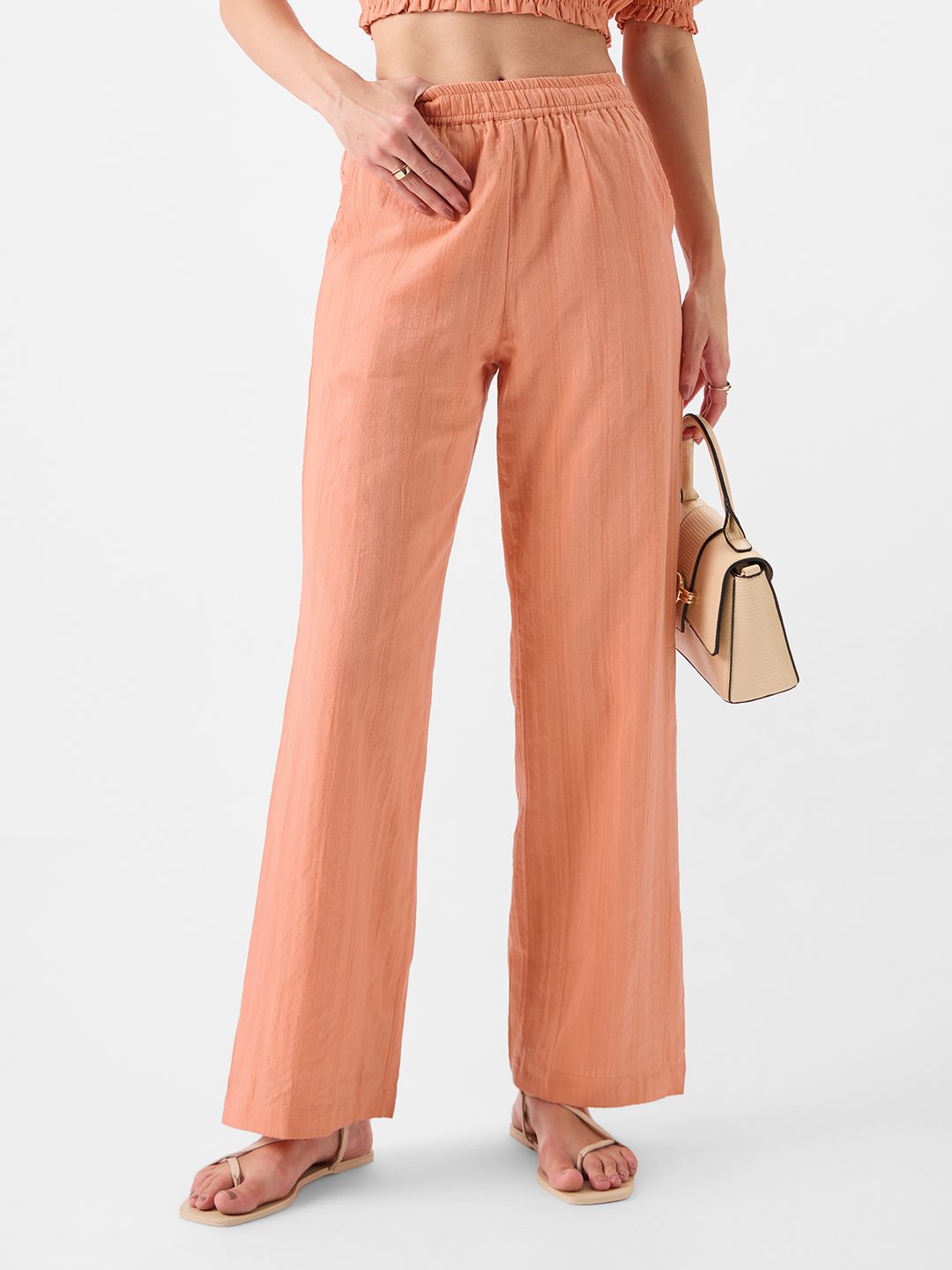 Buy Solids Apricot Women Pants Online.